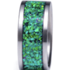 A green stone ring is shown on the side of a silver band.