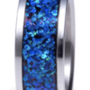 A blue ring with a blue stone on it