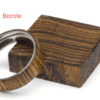 A wooden ring sitting on top of a box.