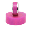 A pink ring is on top of a purple object.