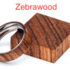 A wooden ring sitting on top of a box.