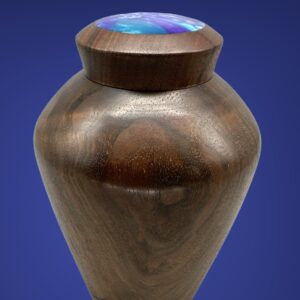 A wooden urn with a blue background