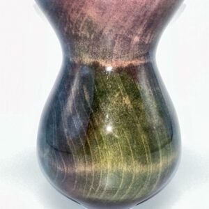 A vase with green and brown swirls on it.